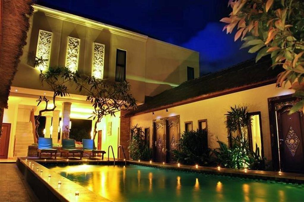 天堂椰林之家酒店 金巴兰 外观 照片