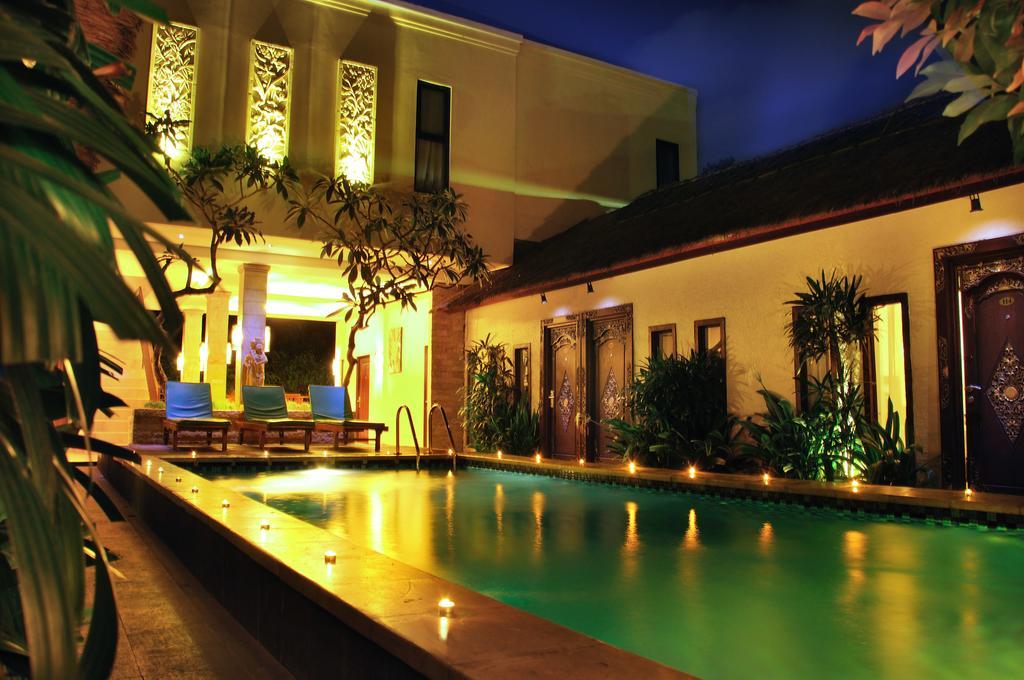 天堂椰林之家酒店 金巴兰 外观 照片